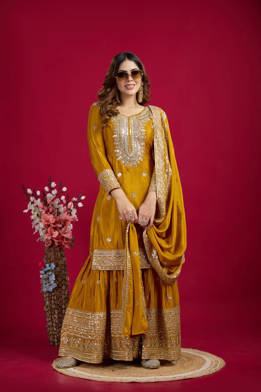 Mustard heavy embroidered silk Anarkali set with matching dupatta