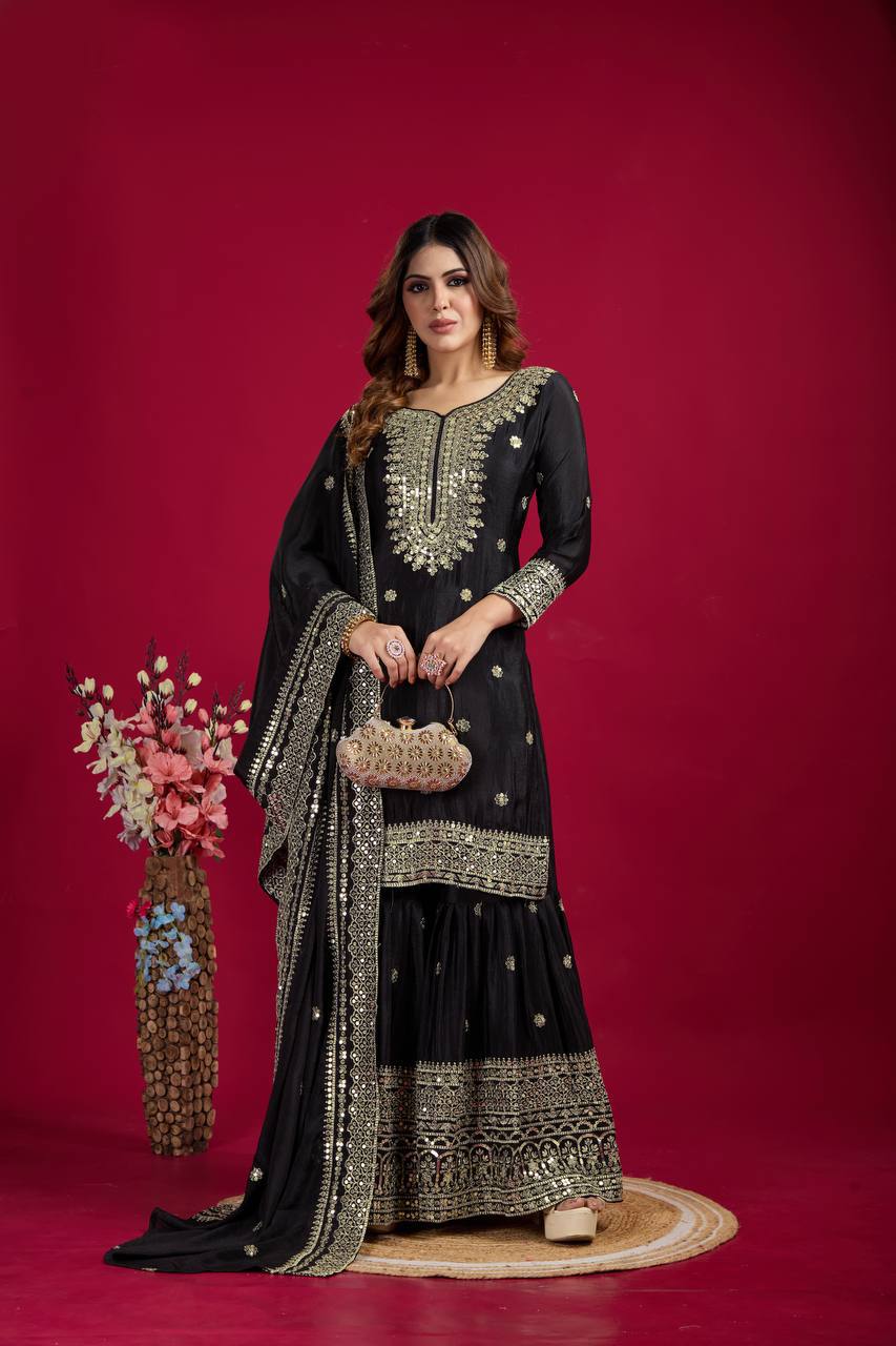 Black heavy embroidered silk Anarkali set with matching dupatta