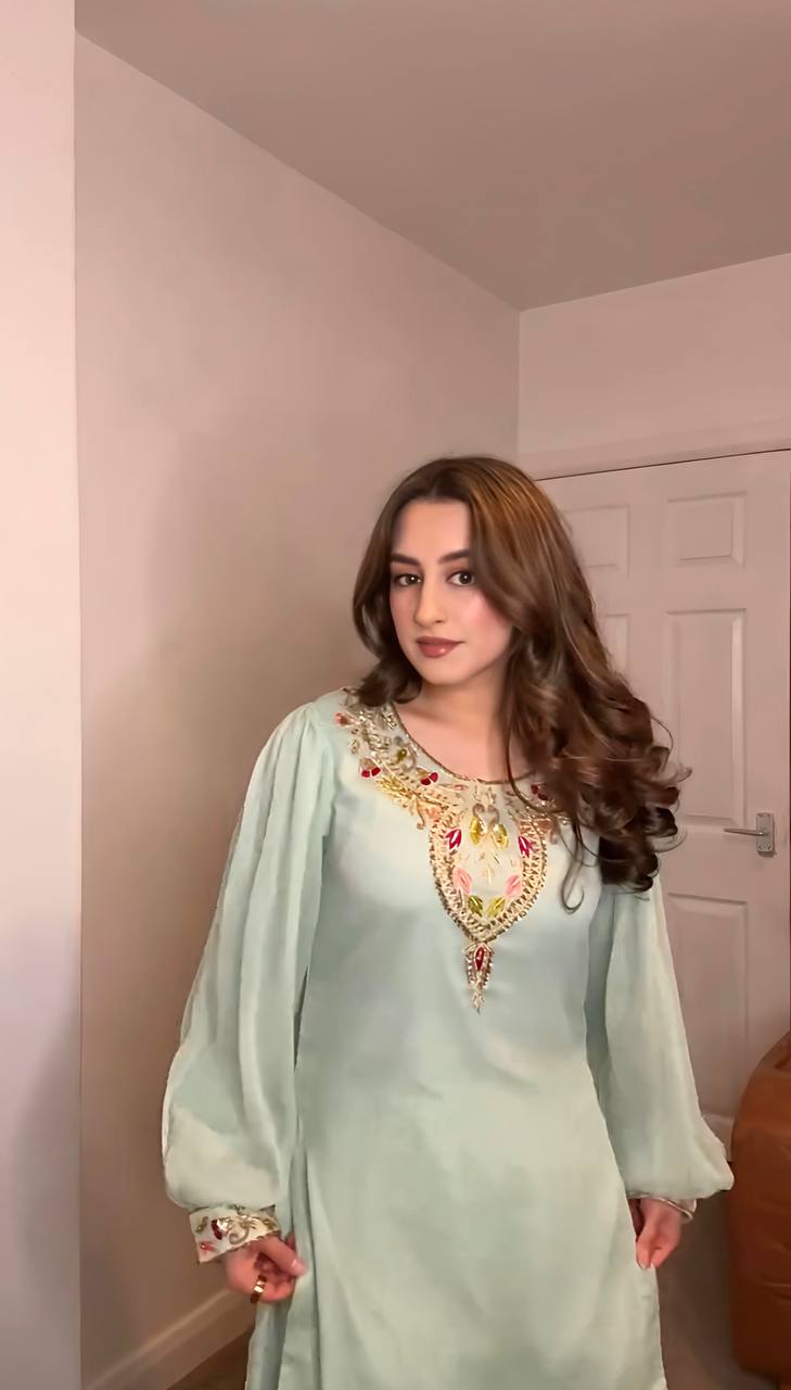 Green straight-cut embroidered suit with dhoti pants and contrast-edge dupatta