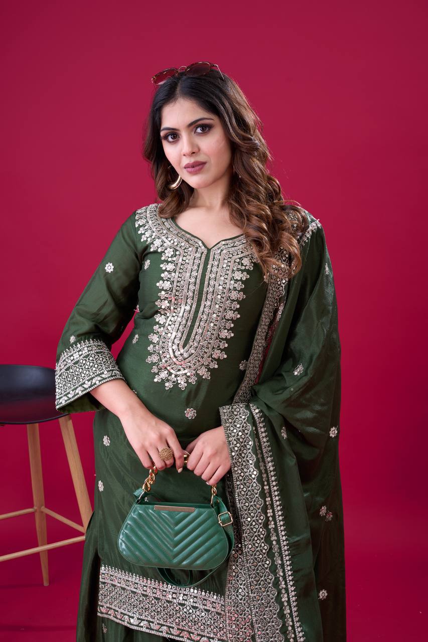 Green traditional ethnic Anarkali gown suit with mirror-work and thread embroidery