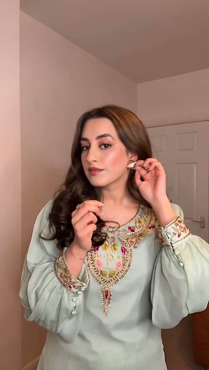 Green straight-cut embroidered suit with dhoti pants and contrast-edge dupatta