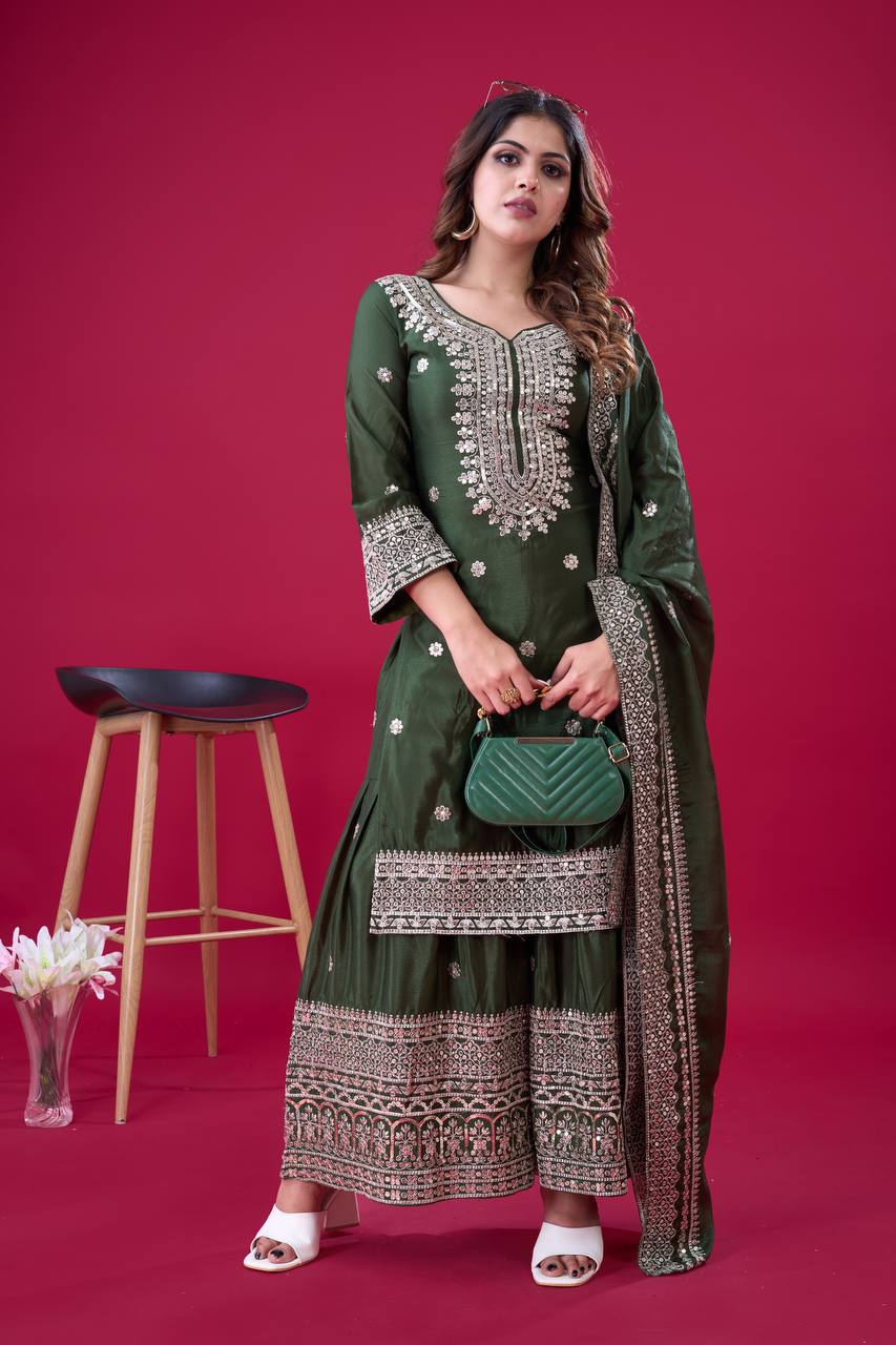 Green traditional ethnic Anarkali gown suit with mirror-work and thread embroidery