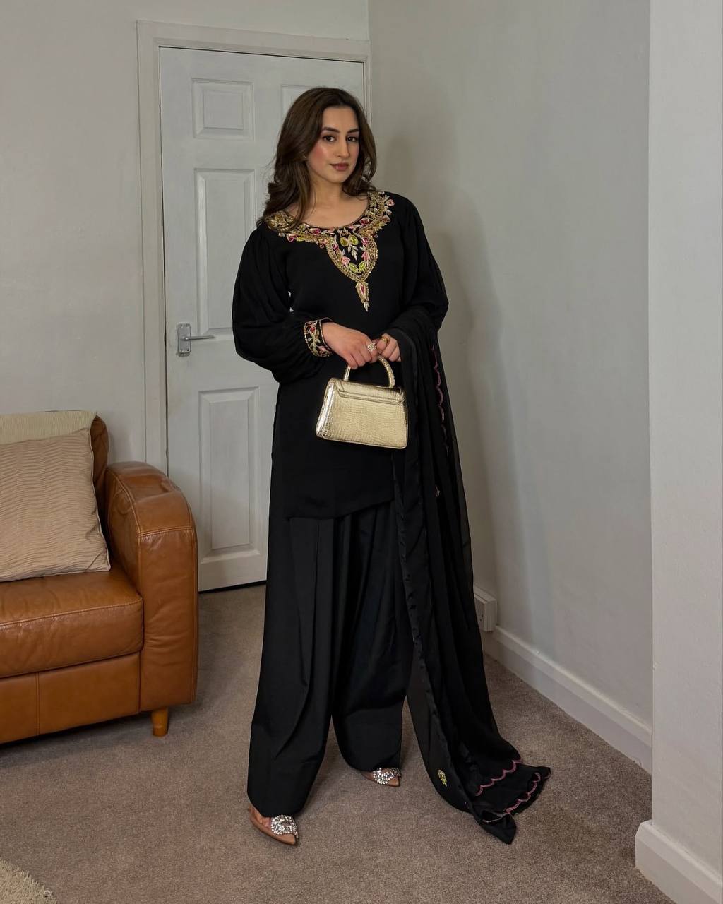 Black straight-cut embroidered suit with dhoti pants and contrast-edge dupatta
