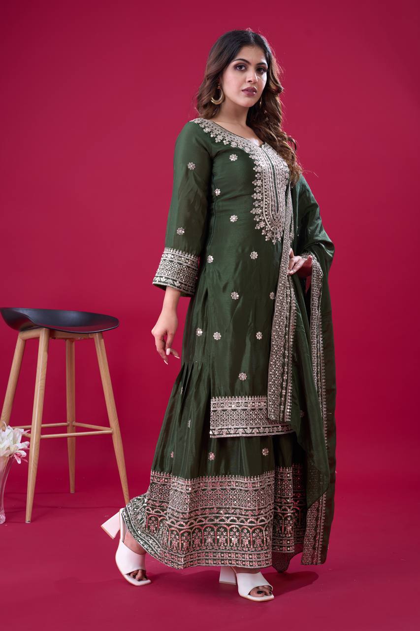 Green traditional ethnic Anarkali gown suit with mirror-work and thread embroidery