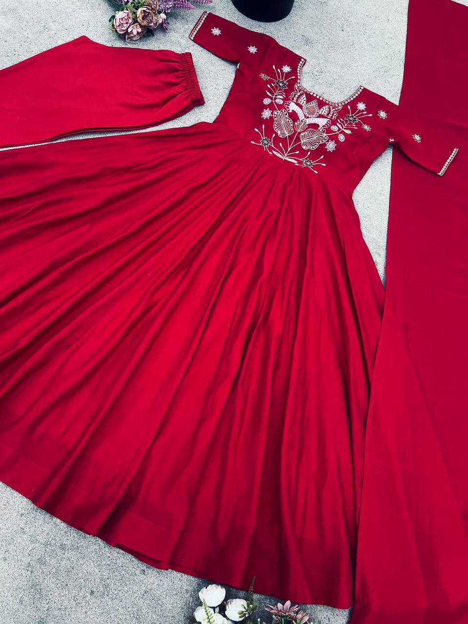 Maroon georgette embroidered high-low kurti paired with straight pants and a matching draped dupatta