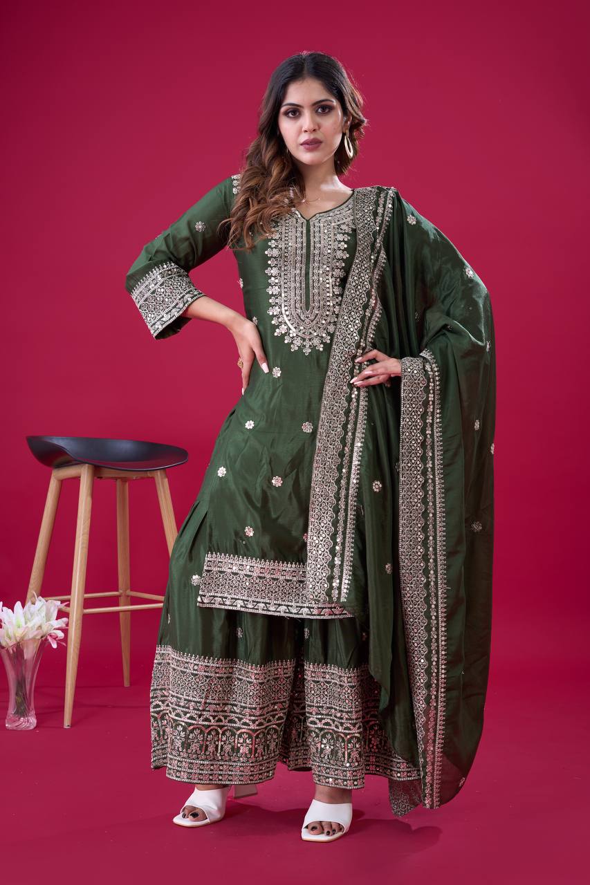 Green traditional ethnic Anarkali gown suit with mirror-work and thread embroidery